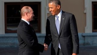 Obama and Putin greet with long handshake [upl. by Mita]